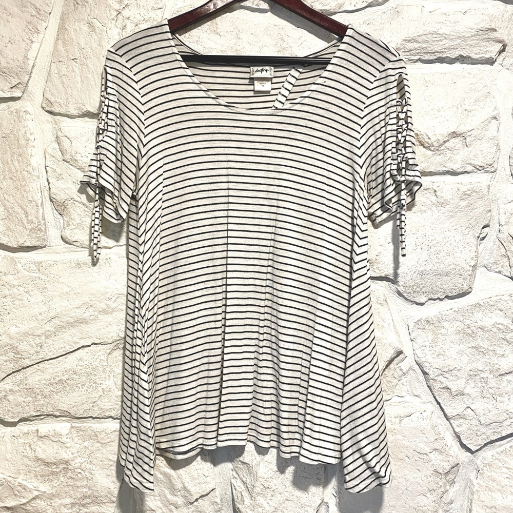 White with black stripe blouse. Size M.